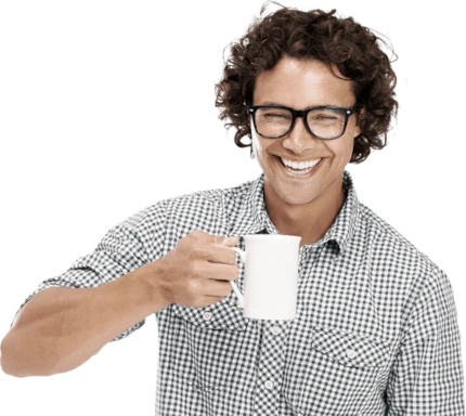 a happy male professional with a coffee mug